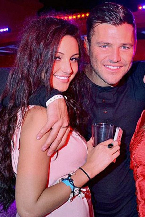 Mark and Michelle were pictured getting very cosy at a nightclub in Dubai