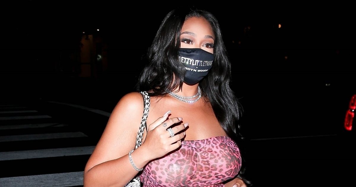 Jordyn Woods slips into a thong in a see-through dress for Hollywood party