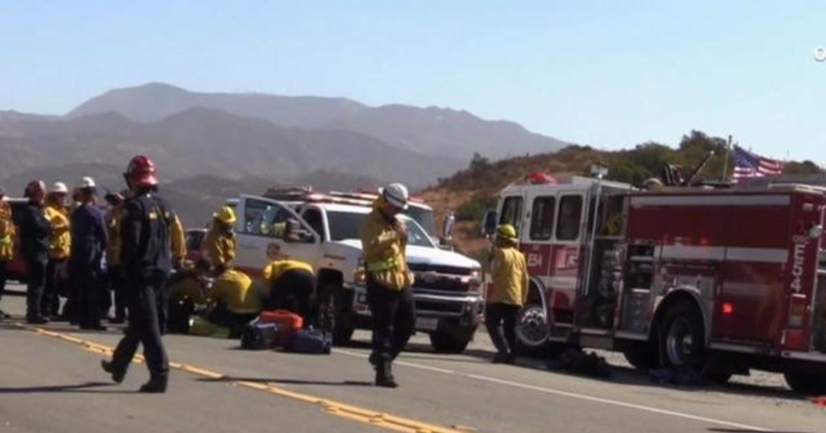 Two firefighters critically injured in Southern California fires, thousands forced to evacuate