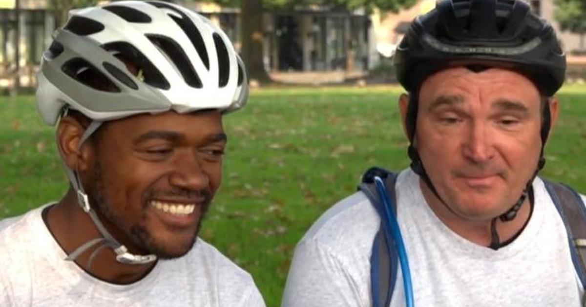 Two men with different backgrounds and political beliefs bike across America to show unity