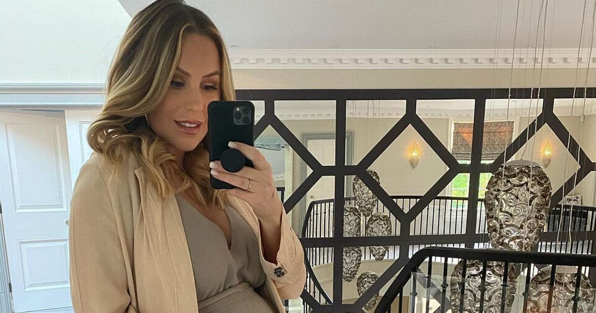 Pregnant Kate Ferdinand looks stunning as she cradles bump after family getaway