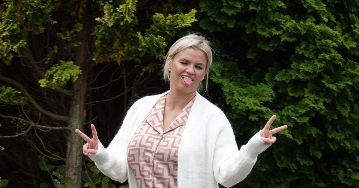 Kerry Katona takes the bins out in flimsy short pyjamas and fluffy slippers