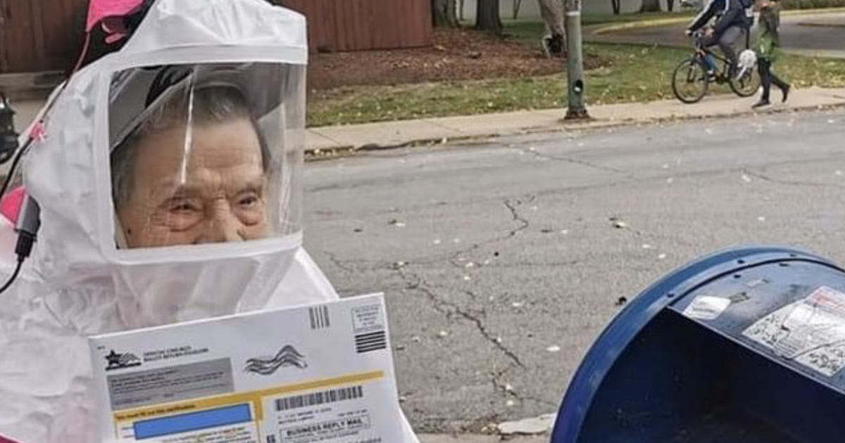 102-year-old mails ballot wearing full PPE