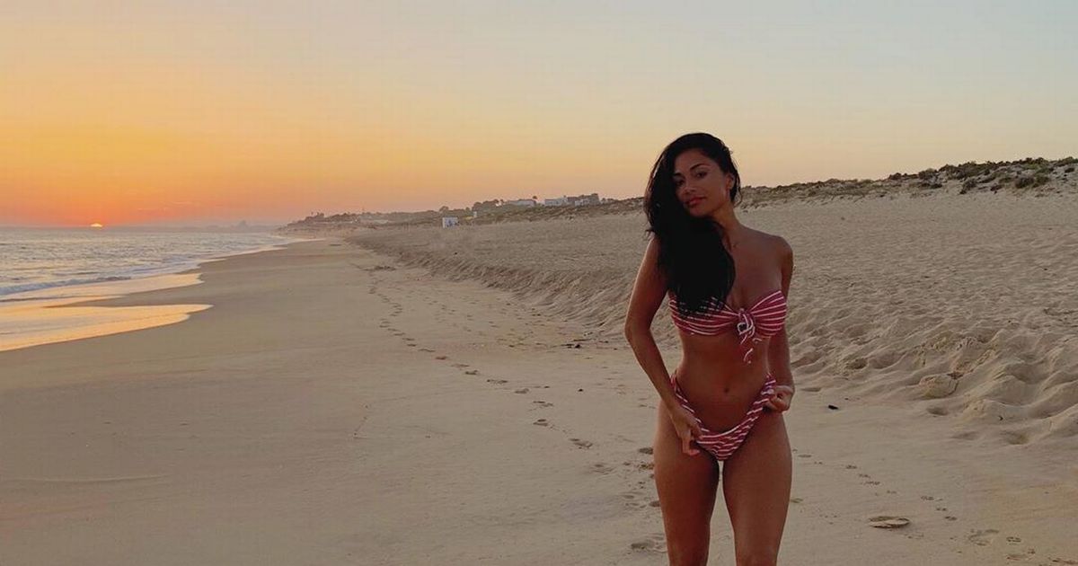 Nicole Scherzinger tugs on barely-there bikini in jaw-dropping beach display