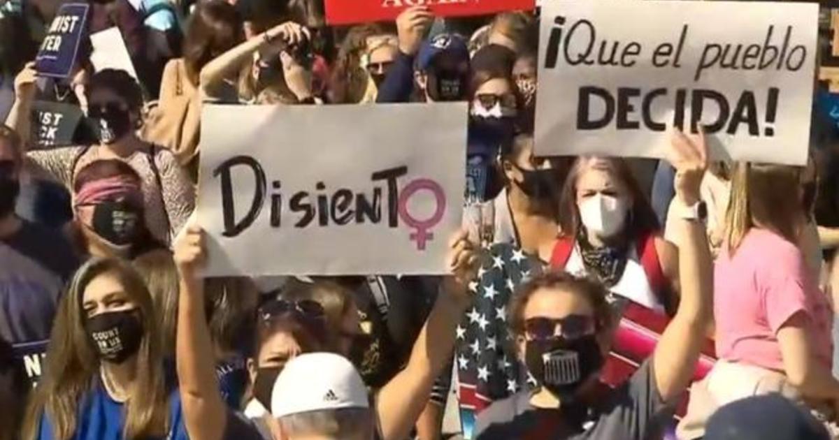 Muted Women’s March goes on during pandemic