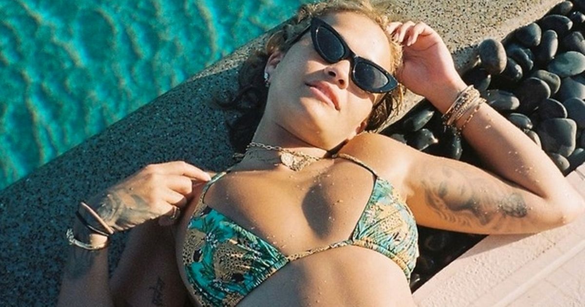 Rita Ora sizzles in eye-popping bikini snaps after sparking engagement rumours