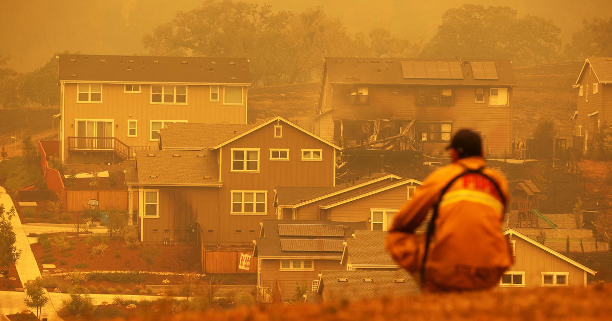 Crews face strong winds while battling California fires