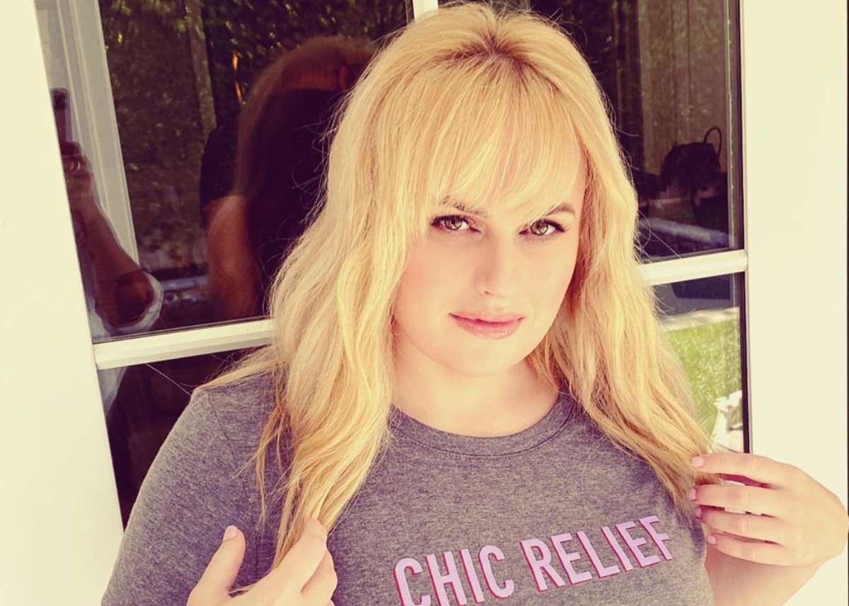 Rebel Wilson Works Out With A Bottle Of Vodka While Wearing Gucci