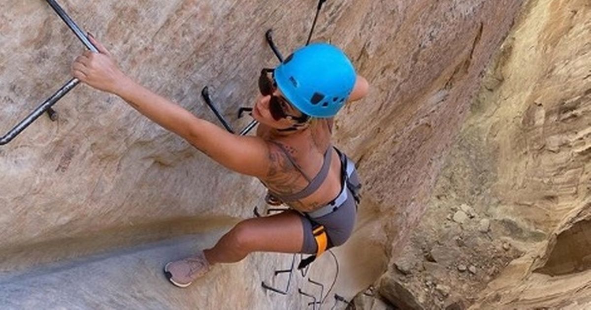 Lady Gaga shows off strength as she goes rock climbing in hard hat and bra top