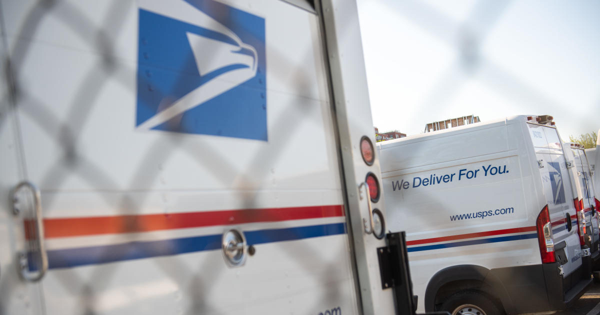 Postal worker charged for throwing out mail