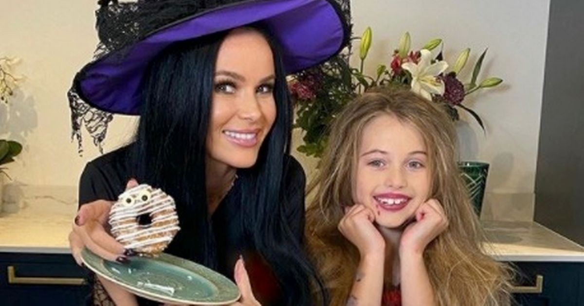 Amanda Holden looks amazing with dark hair as she dresses as witch for Halloween