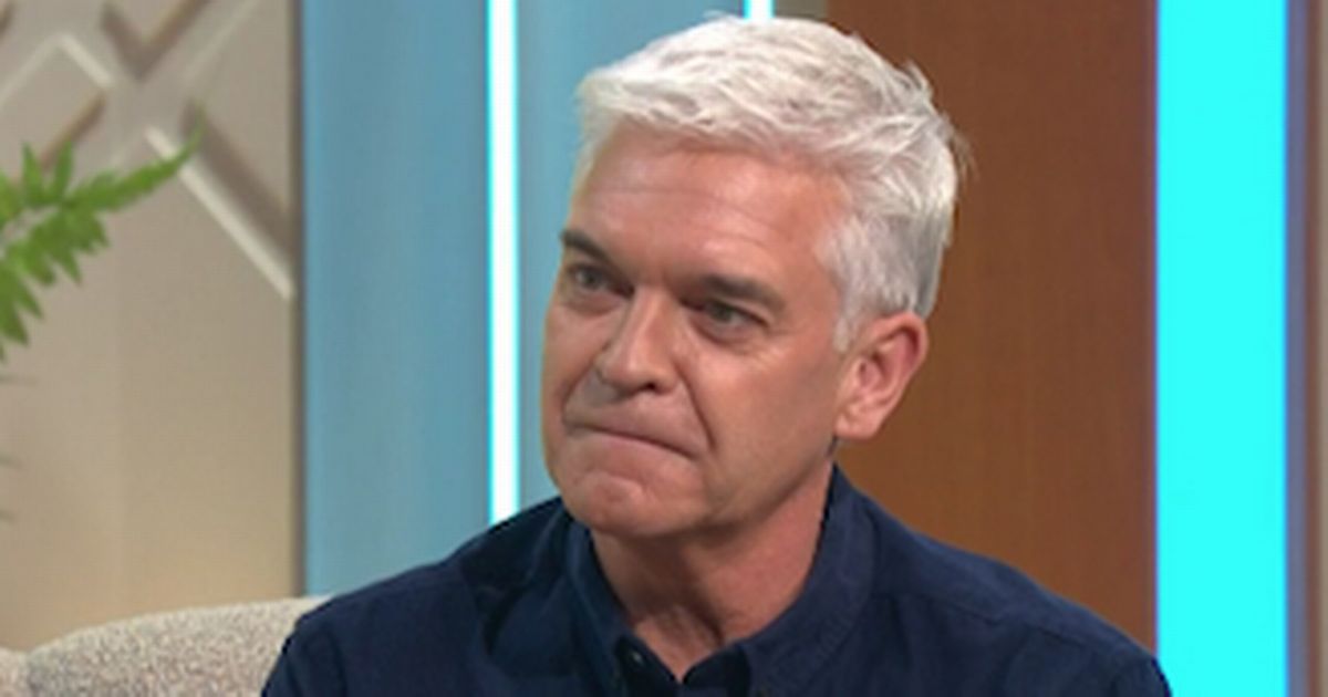 Phillip Schofield smokes cigarette on night out after bombshell feud claims