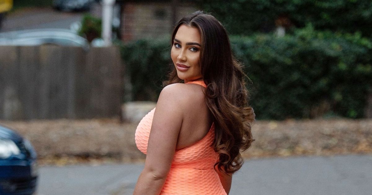 Lauren Goodger parades famous curves as romance with beau Charles Drury hots up