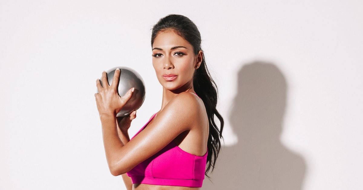 Nicole Scherzinger sizzles in crop top and leggings for new workout photoshoot