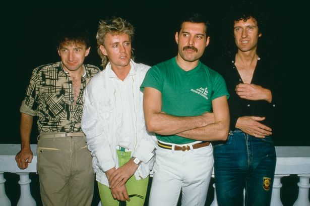 Freddie Mercury with his Queen bandmates in 1985