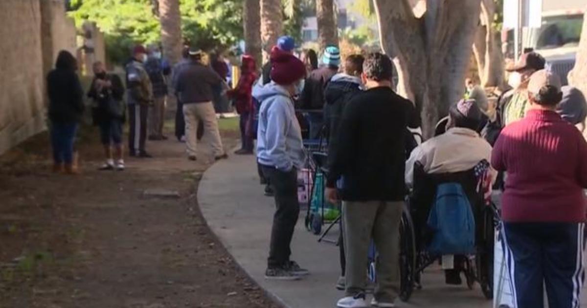 With food insecurity on the rise nationwide, food banks see massive Thanksgiving lines