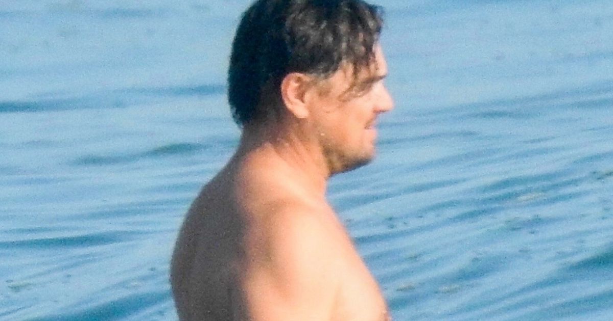 Shirtless Leonardo DiCaprio shows off ‘dad bod’ as he hits the beach with pals