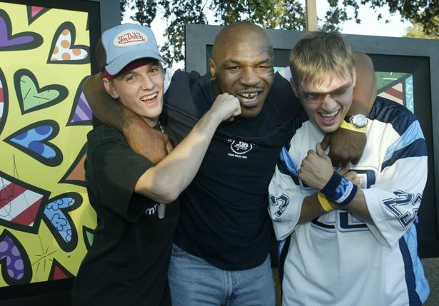 Mike Tyson with singers Aaron and Nick Carter