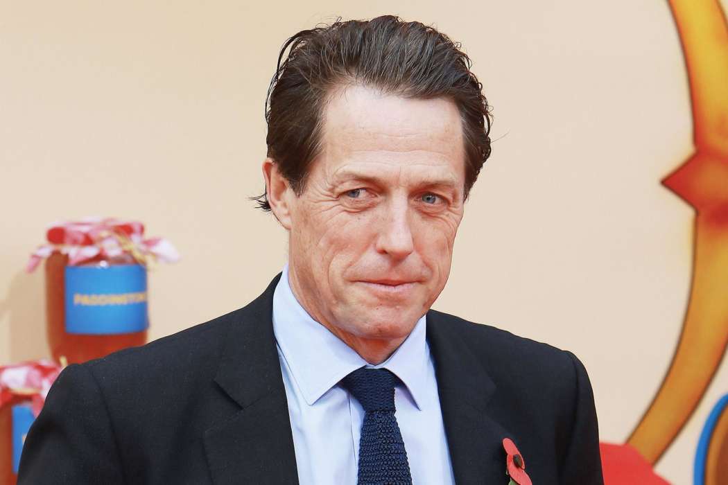 Hugh Grant Describes Grueling COVID-19 Battle – Jokes That His Eyeballs Were ‘Too Big’ For His Head