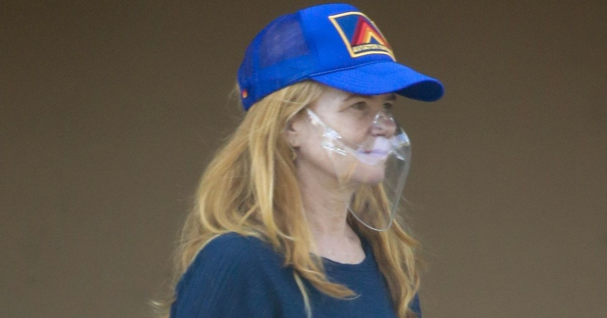 Make up-free Patsy Palmer stays safe in face visor as she shops in Malibu