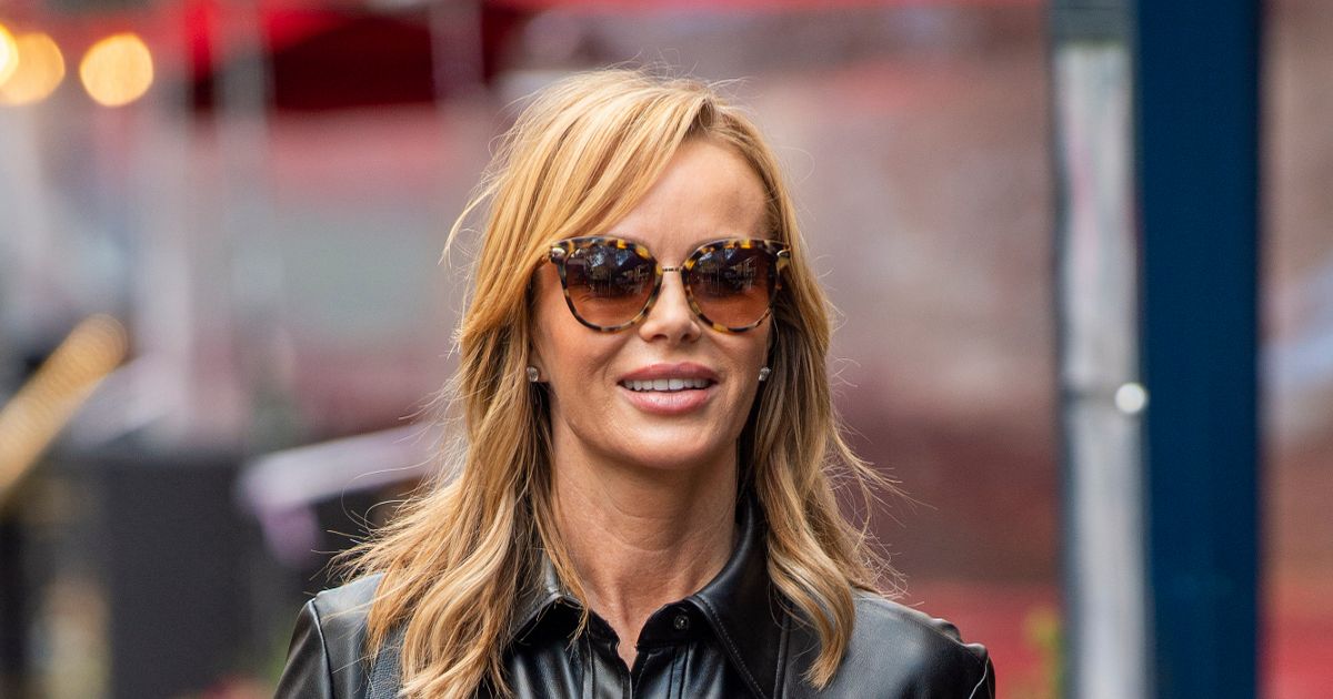 Amanda Holden shows off her age-defying body in skintight leather dress