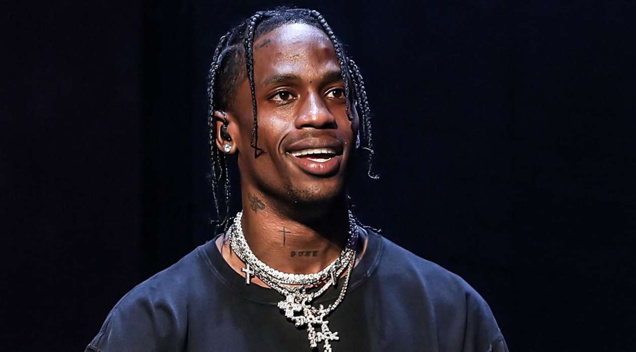 Travis Scott Shares Rare Photo Where He’s Actually Smiling