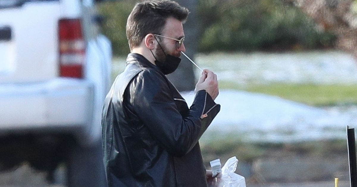 Chris Evans pictured giving himself Covid-19 test on Don’t Look Up movie set