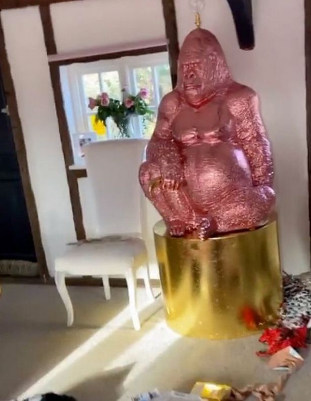 A pink gorilla keeps guard upstairs