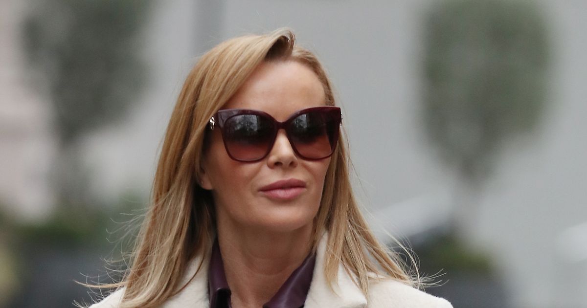 Amanda Holden looks effortlessly chic in leather dress and sexy thigh-high boots