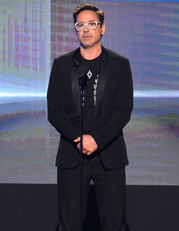 Actor Robert Downey Jr. speaks onstage