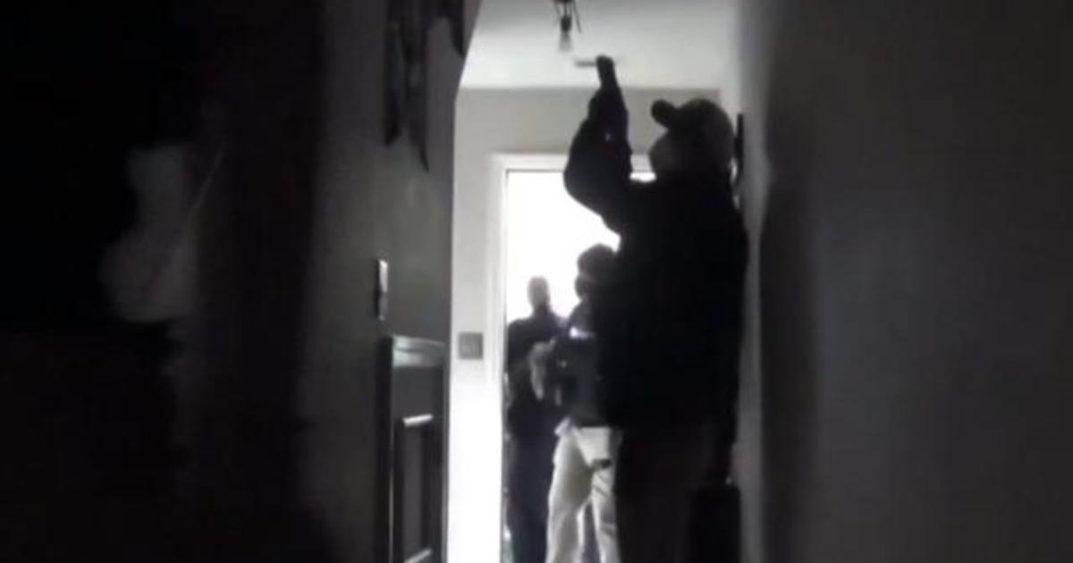 Fired COVID-19 data scientist posts video of armed agents raiding her home