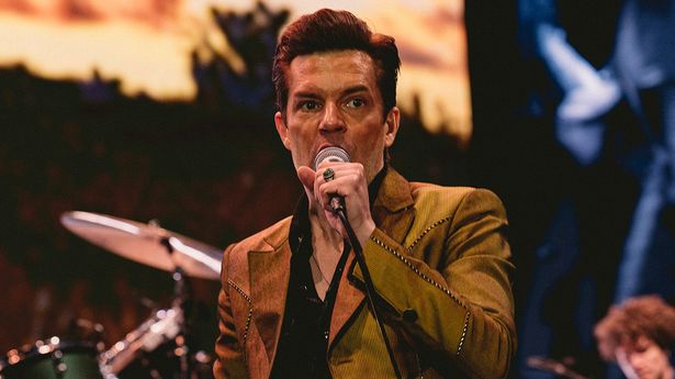 The Killers had to halt Old Trafford gig because pensioner wanted to 'enjoy himself'