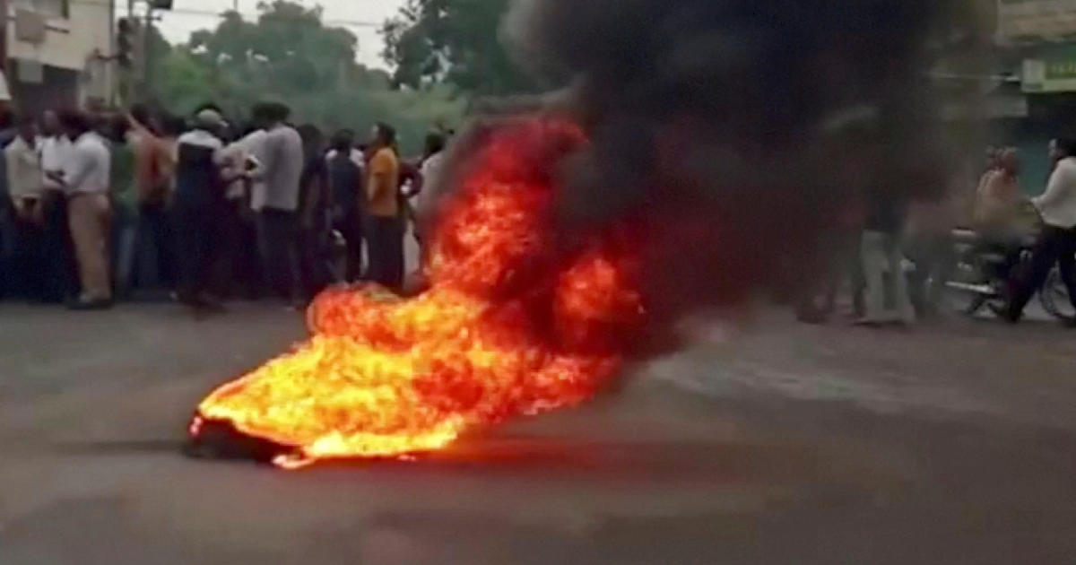 Curfew imposed as sectarian tension soars after a brutal murder in India