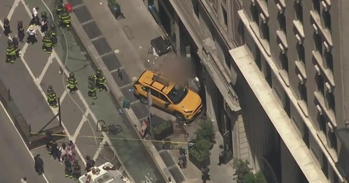 3 critically injured when NYC taxi jumps curb, hits building