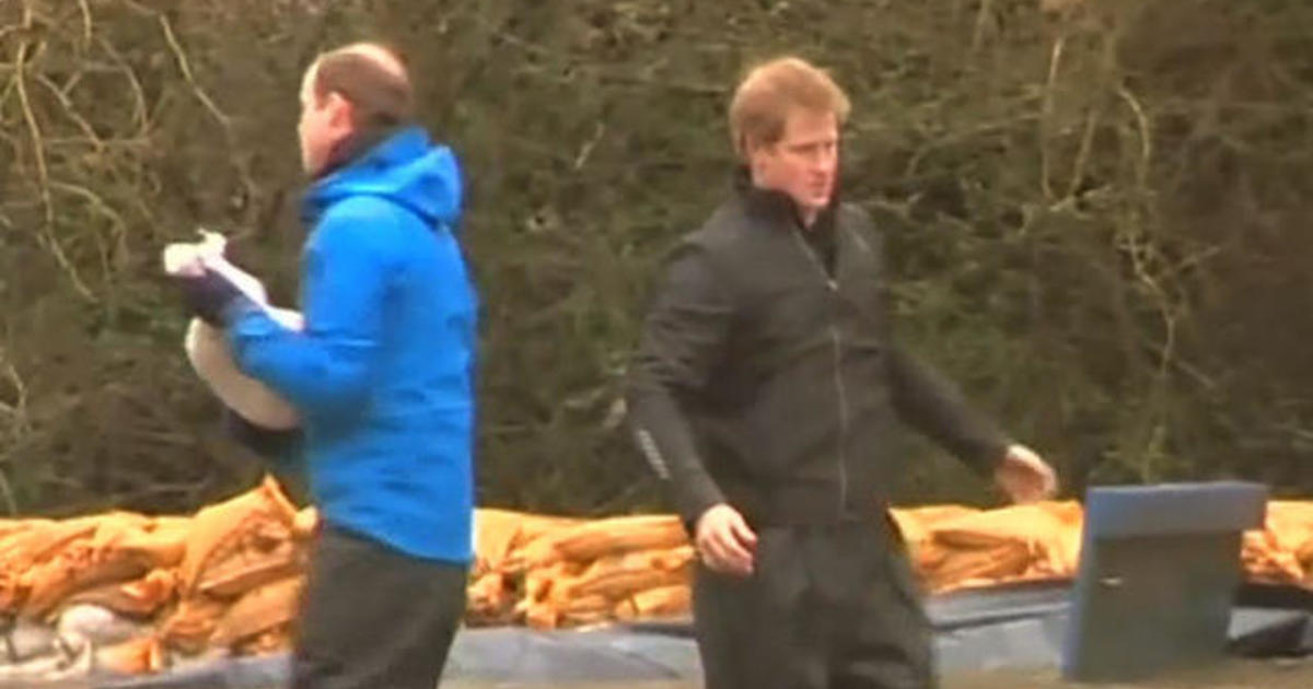 Princes William and Harry join flood sandbagging effort