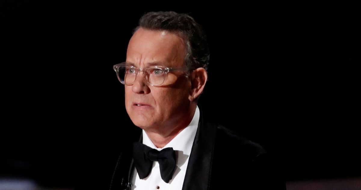 Tom Hanks fans fear for actor’s health as he’s unable to control shaking hand on stage