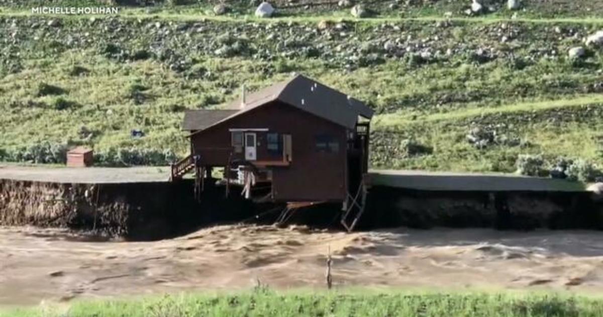 Family watches as their home falls into Yellowstone River