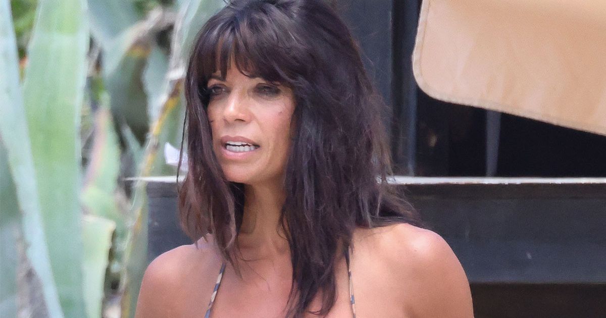 Jenny Powell shows off toned figure in tiger print bikini as she holidays with daughter