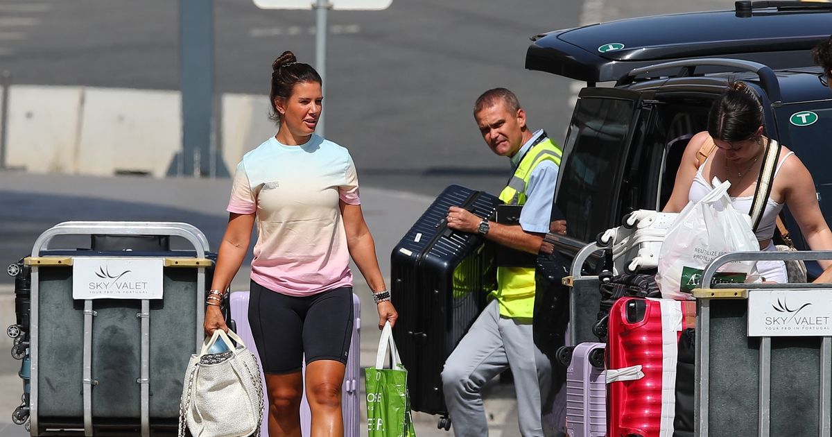 Rebekah Vardy keeps it casual as she’s pictured leaving Portugal following holiday