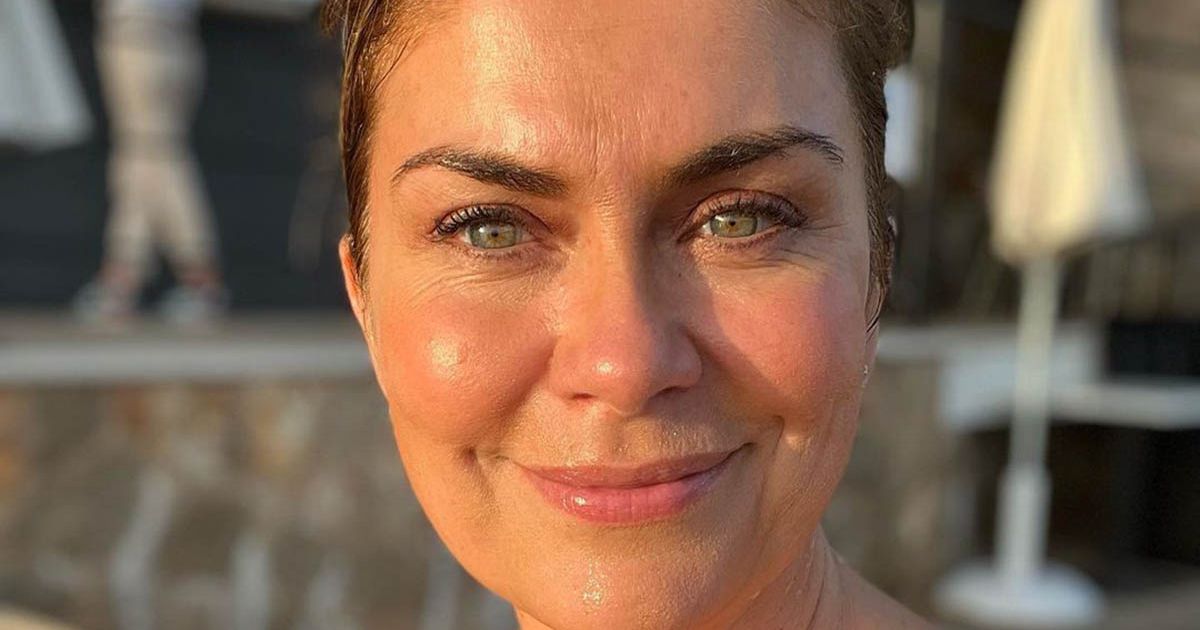 A Place In The Sun’s Amanda Lamb, 50, shows off beach body as she strips to a bikini