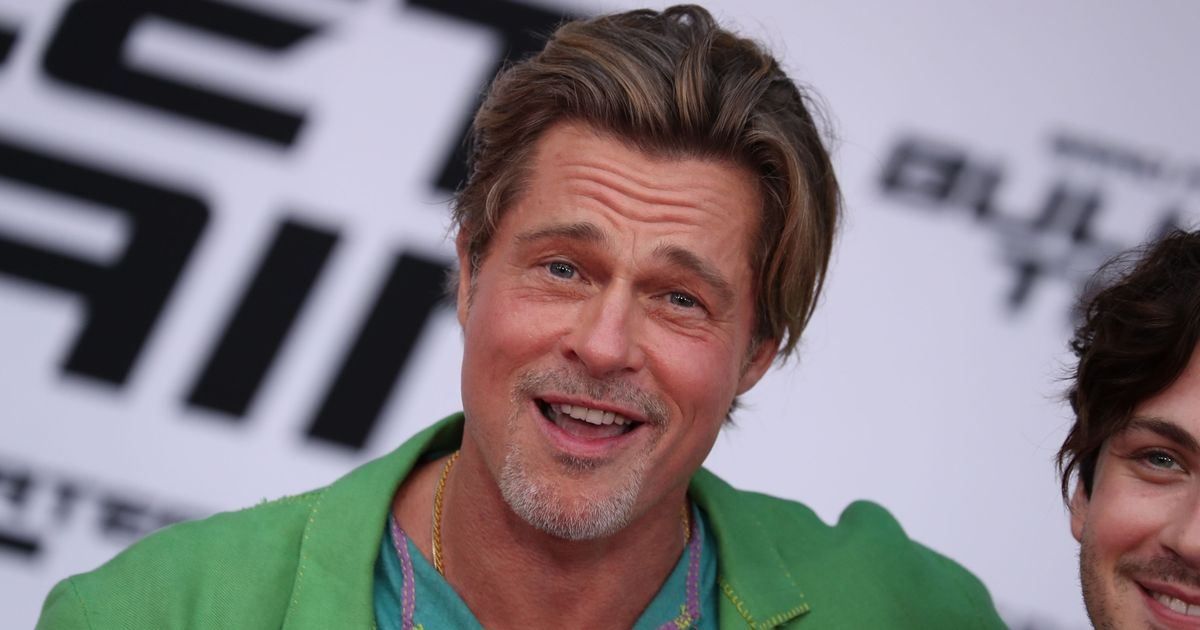 Brad Pitt denies retirement claim as he dons bright suit on red carpet for film premiere