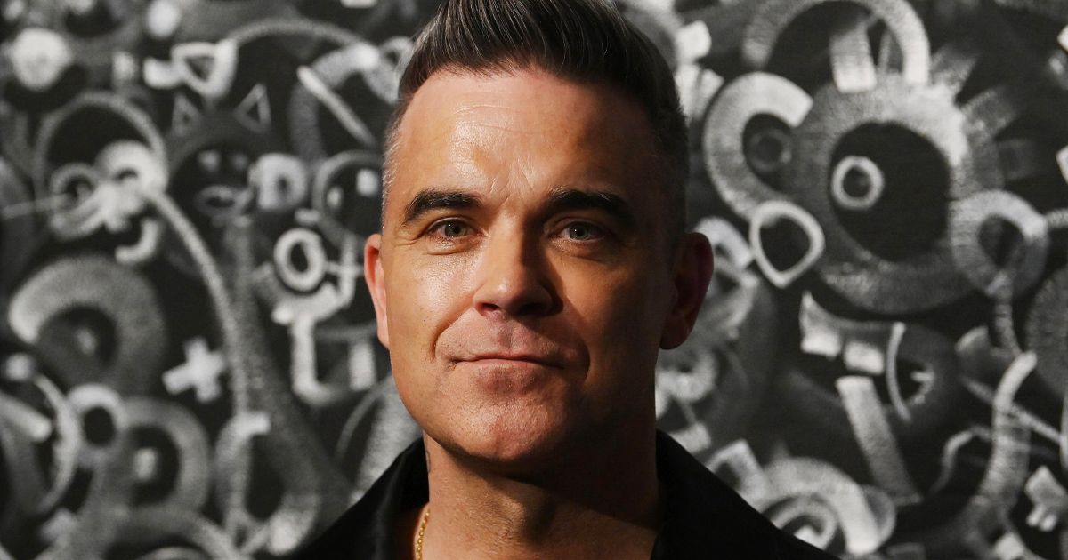 Robbie Williams reveals how he’s coping with losing his hair at 48