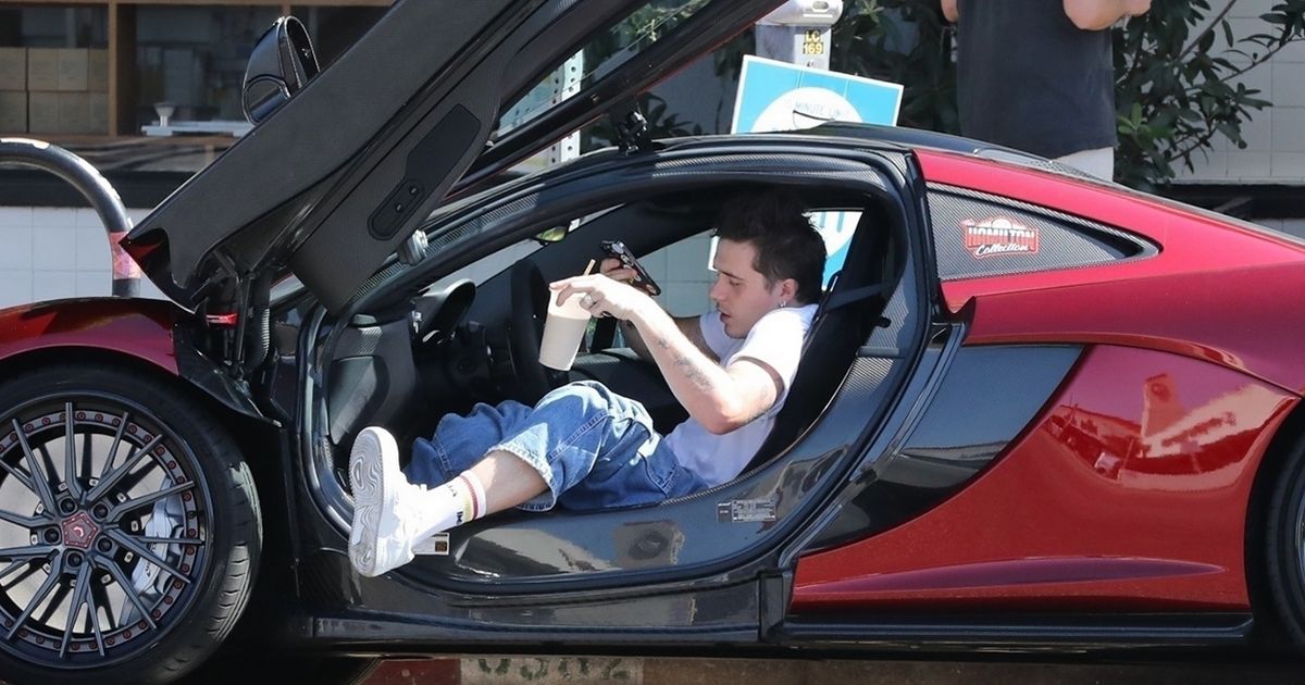 Brooklyn Beckham struggles to get out of dad’s £280k supercar as he borrows ride