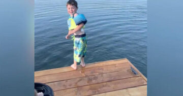 Boy finds the courage to jump off dock into Alaska lake