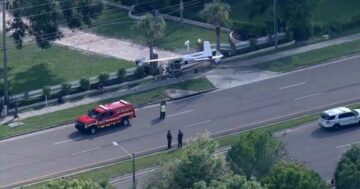 Video shows plane crashing through fence and into driveway in Florida