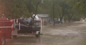 Heavy rain floods Dallas area, storm moves east