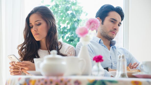 Couple arguing in restaurant