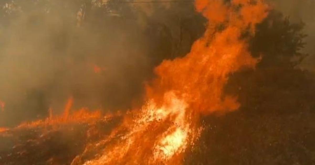 Deadly California wildfire explodes in size