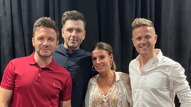 Coleen Rooney parties with Westlife